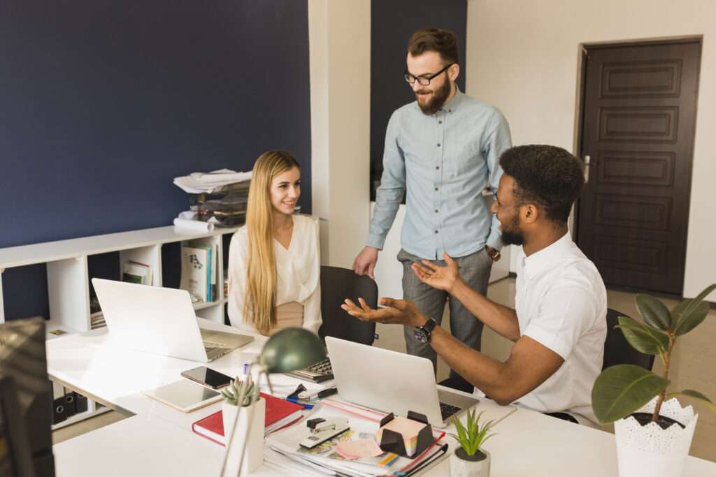 colleagues talking office